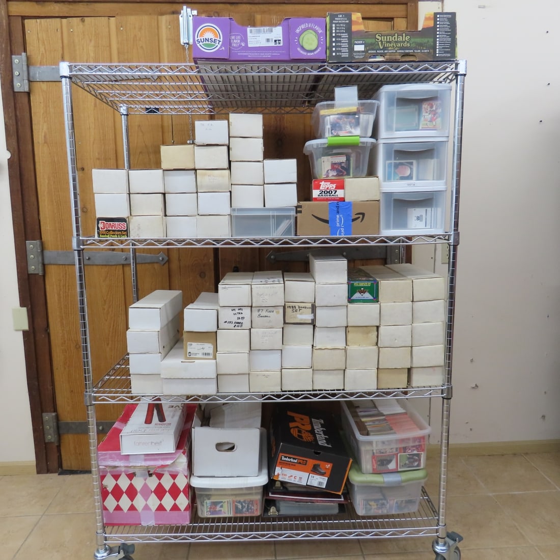 Huge collection of mixed sports cards, mostly 80s.: loose in bins and boxes and binders. Cart not included. Shipping will be over $200 Please ask questions and read terms & conditions before bidding.