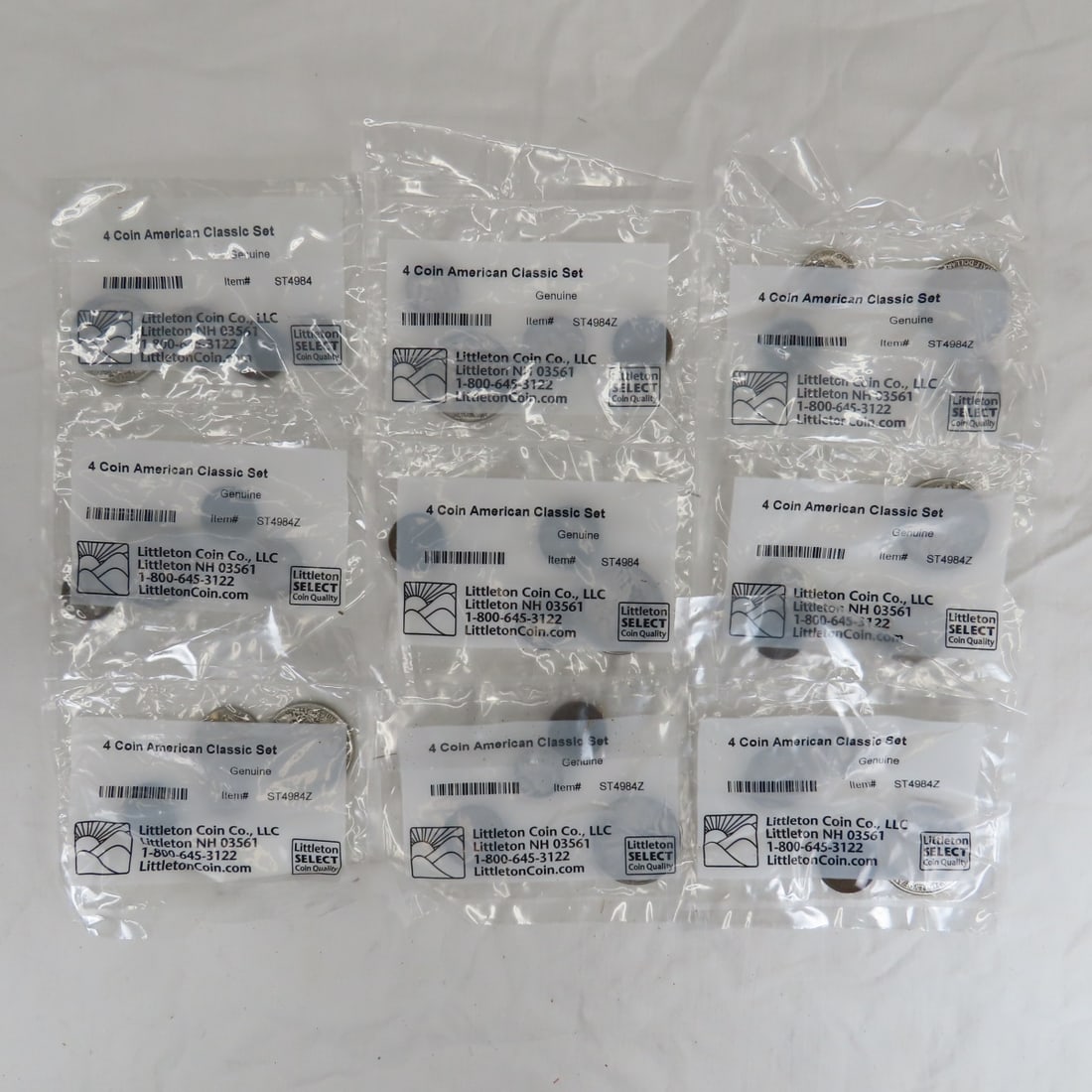 9 Littleton Coin 4 Coin American Classic Sets: all sealed, each set includes 1 Walking Liberty Half Dollar, 1 Mercury Dime, 1 Buffalo Nickel, & 1 Indian Head Cent, total of $5.60 Face 90% silver coins plus the 9 nickels & 9 pennies Please ask ques