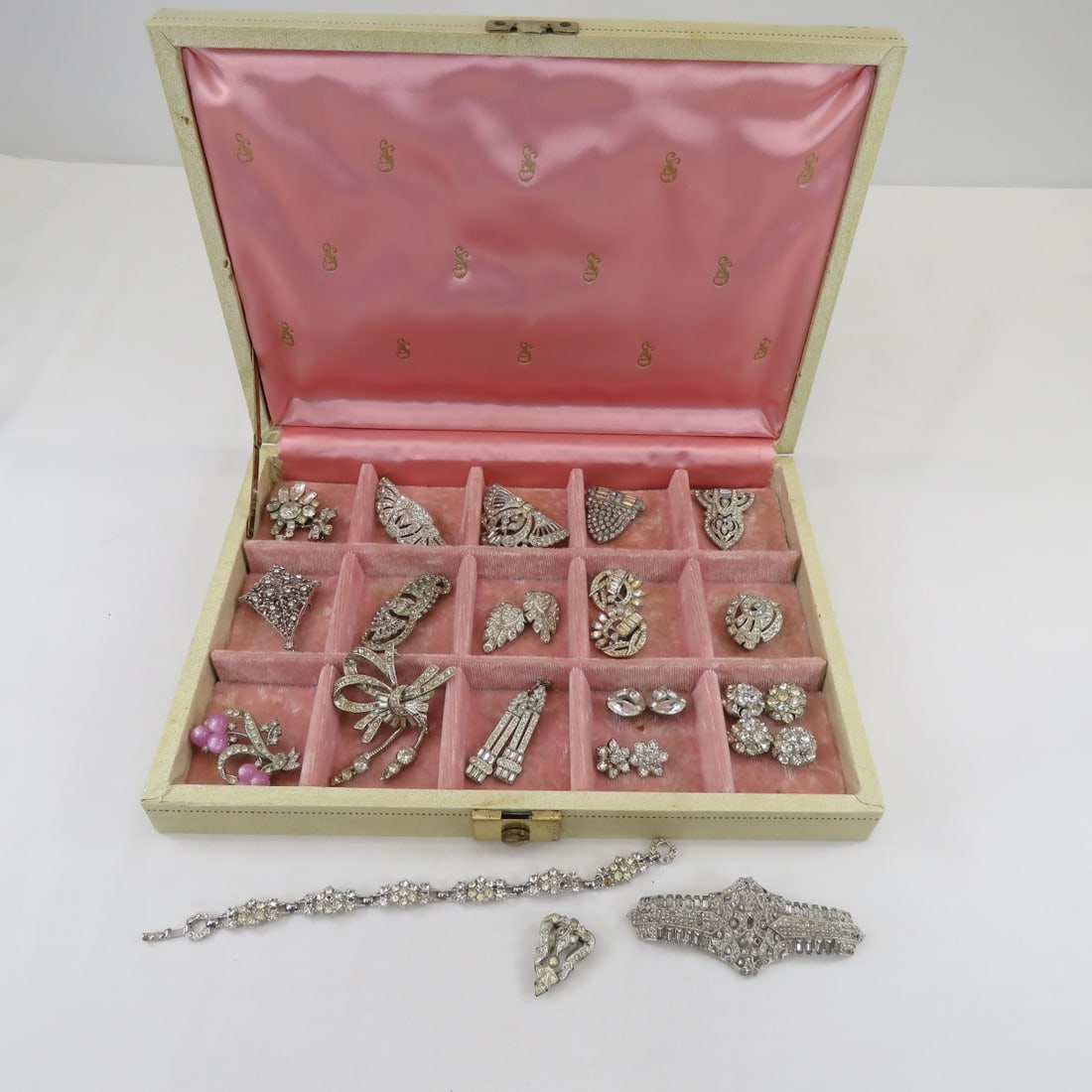 Edwardian to Vintage Paste & Rhinestone Jewelry: Edwardian to Vintage Paste & Rhinestone Jewelryall silver tone and rhinestones- most are missing at least 1 stone. 1 pair & 5 single dress clips, 2 pair earrings- 1 clip - 1 screw back, 8 brooches, 1