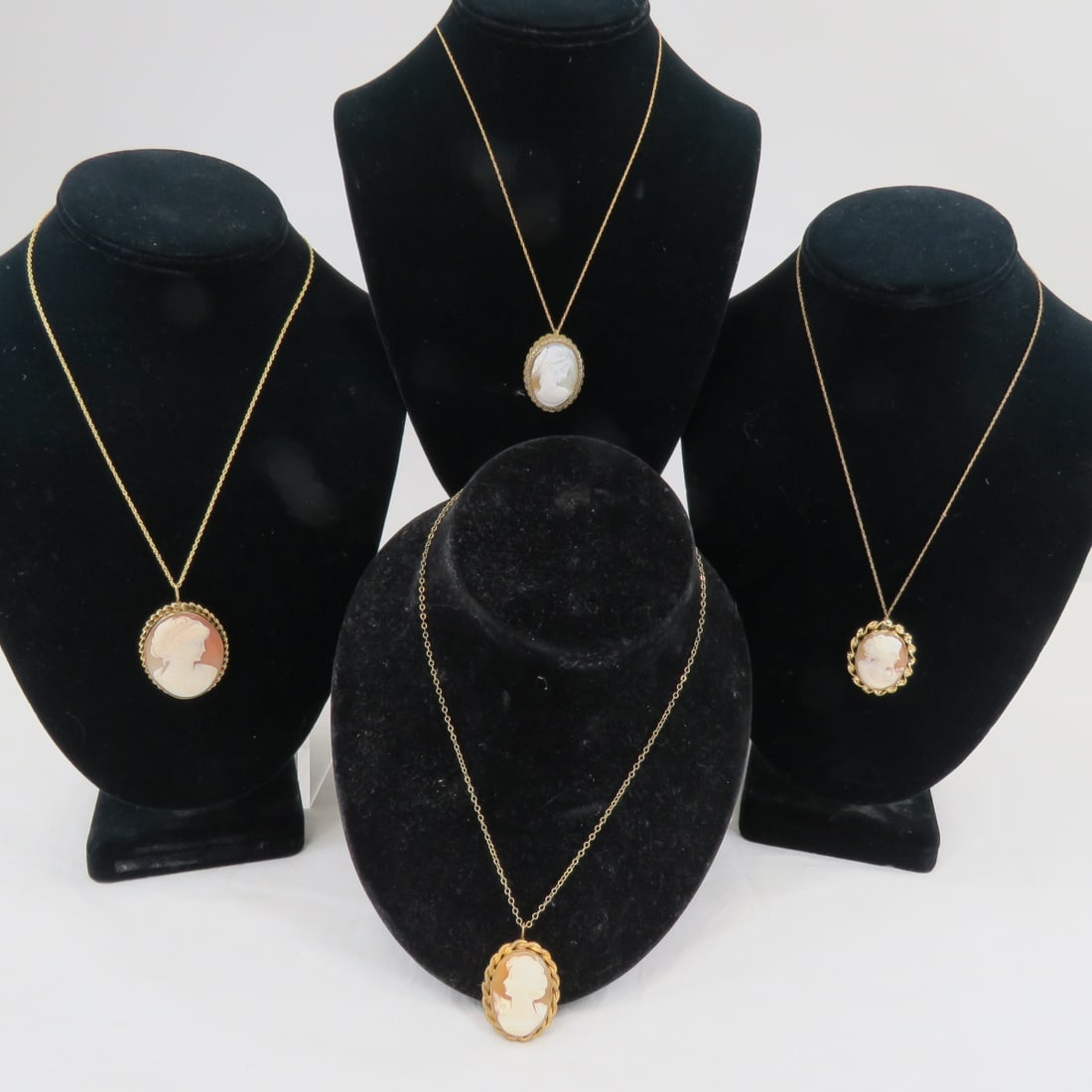 4 Gold Filled Cameo Brooch Pendants with Chains: 4 Gold Filled Cameo Brooch Pendants with Chains1) 1.2" 800 cameo on 1/2014KGF N/C chain, 2) 1.5" 1/20 12KGF cameo on 1/2014KGF N/C chain, 3) 1.1" 1/20 12KGF cameo on GF chain, 4) 1.25" 1/20 14KGF TK c