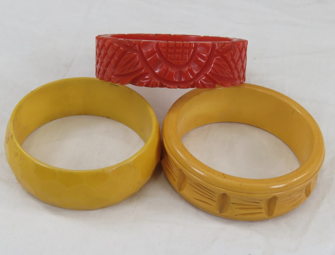 1 Cherry & 2 Mustard Yellow Bakelite Bracelets: 1 Cherry & 2 Mustard Yellow Bakelite Bracelets Please ask questions and read terms & conditions before bidding.