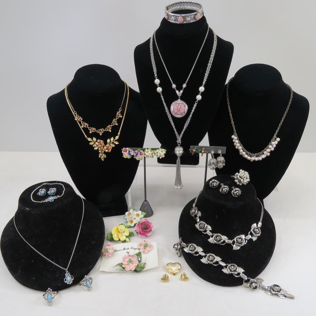 Coro, English Porcelain & Other Floral Jewelry: Coro, English Porcelain & Other Floral JewelryCoro multi-color stone screw back earrings, silver and pink rose necklace and bracelet marked R, silver parure has extra earring Please ask questions and