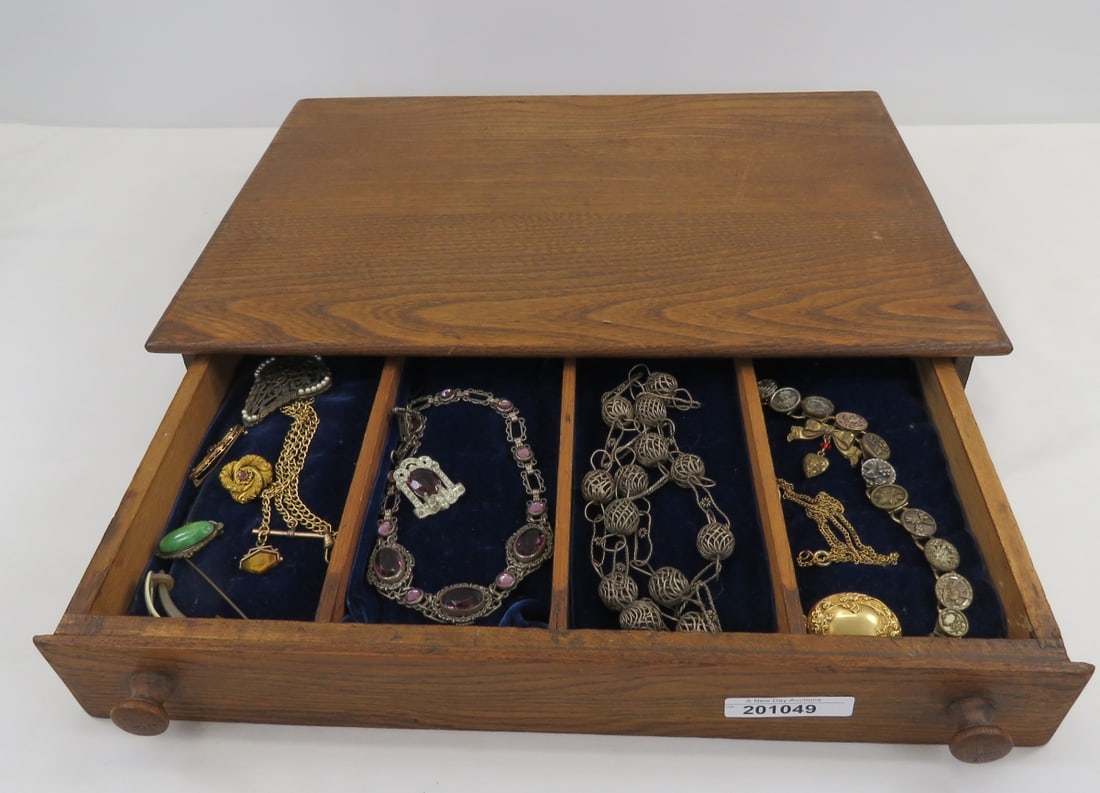 Antique Jewelry in Wood Jewelry Drawer: Antique Jewelry in Wood Jewelry Drawerwood drawer is 16x11x3", purple glass necklace and brooch, button bracelet, watch fob, locket & other jewelry Please ask questions and read terms & conditions bef
