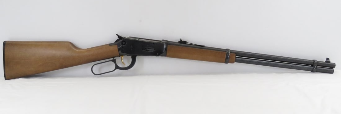 Winchester 94AE .30-30 WIN Lever Action Rifle: Winchester 94AE .30-30 WIN Lever Action Rifle20" barrel, front & rear sights, gold trigger, wood forearm & stock, very good condition, SN# 6380812, with booklet & bag (some t ears inside bag. Please a