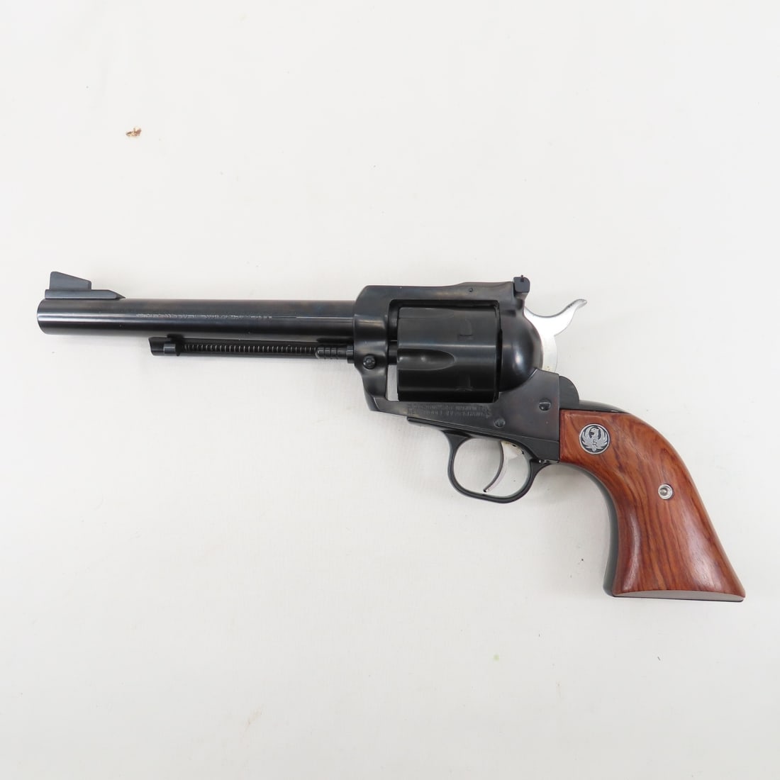 Ruger New Model 318 Blackhawk .357/9mm Revolver: Ruger New Model 318 Blackhawk .357/9mm Revolver6 1/2" barrel, front & rear sights, 6 shot, wood grips with Ruger logo inlay, both 357 mag & 9mm cylinders, SN# 37-67186, in original plastic case with p