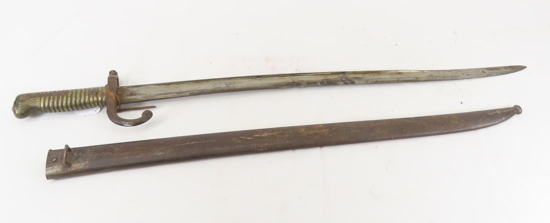 1873 French Chassepot Rifle Bayonet: 1873 French Chassepot Rifle Bayonetmarked "Mre De "Armes de St Etienne Juliet 1873", 22.5" blade, 27.5" OAL, Brass handle with hooked guard marked 9651, original matching steel scabbard marked Q 9651,