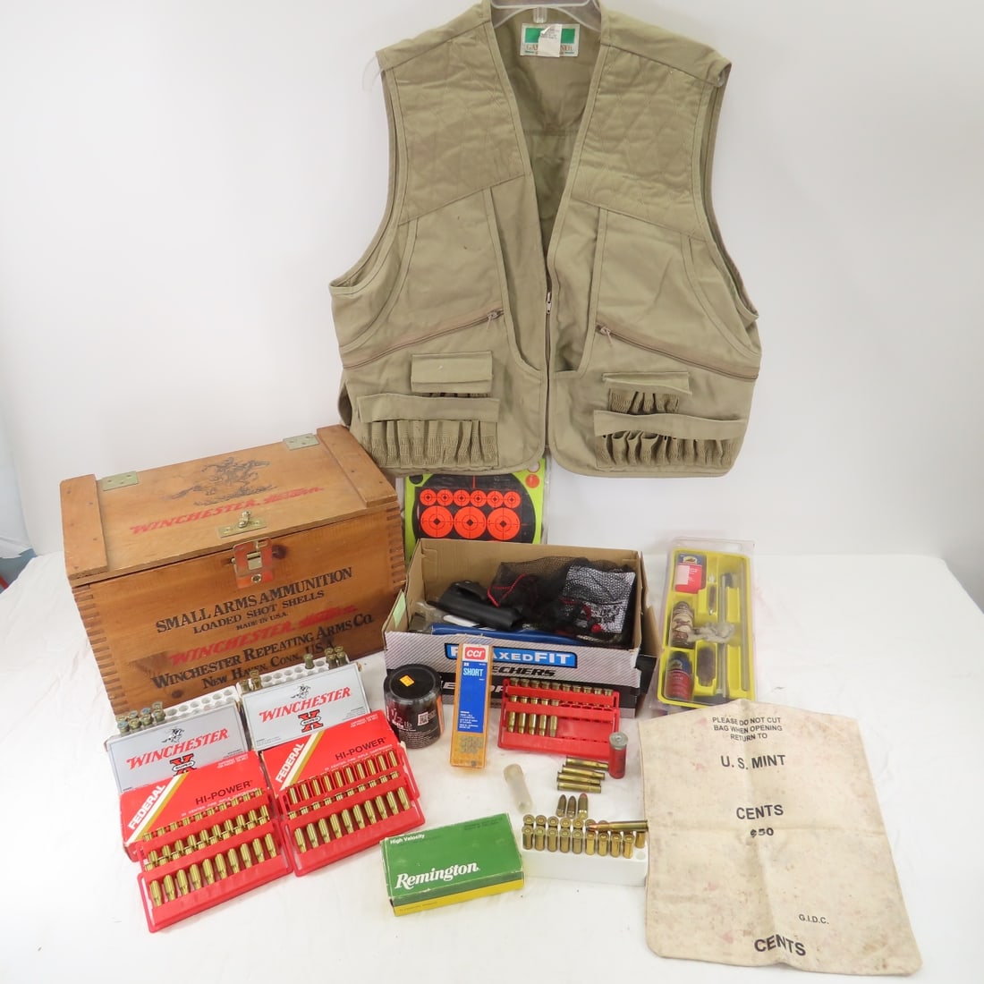 Mixed Ammo, Gun Cleaning Kits, Targets, Box: Mixed Ammo, Gun Cleaning Kits, Targets, BoxWinchester wooden box 16x10x11", 1 exploding target, 30-30 and other ammo, vest Please ask questions & read terms & conditions before bidding.