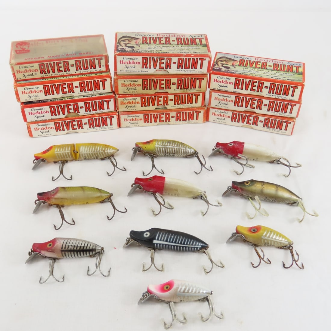 21 Vintage River Runt fishing lures with boxes: 21 Vintage River Runt fishing lures, 11 with boxes Please ask questions & read terms & conditions before bidding.