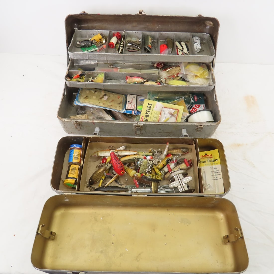 Vintage tackle boxes with lures and gear: Vintage tackle boxes with lures and gearmany collectible lures Please ask questions & read terms & conditions before bidding.
