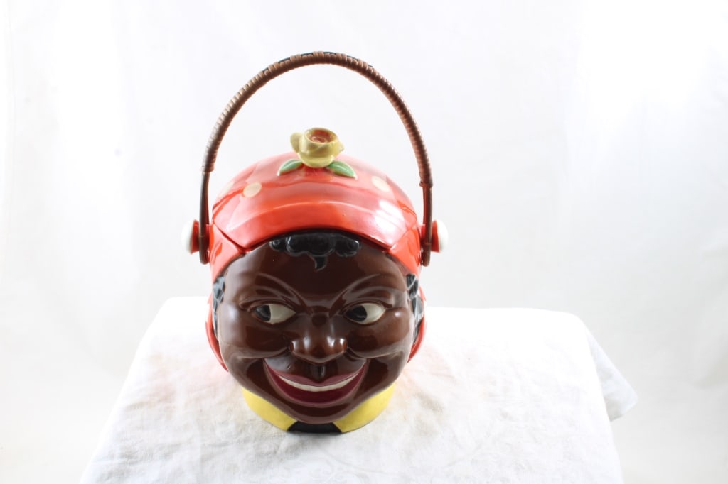 Black Americana Bisquit/Cracker Jar Mammy: Black Americana Bisquit/Cracker Jar MammyMeasures 7 1/2" Tall - made in Japan Maruhan Ware as pictured. Please ask questins and read terms & conditions before bidding.