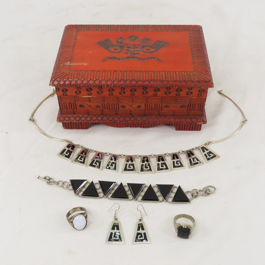 Jewelry box with Sterling Mexico Jewelry: Jewelry box with Sterling Mexico Jewelry moonstone ring marked Bell 204, stone has crack on underside, size 10 inlay necklace and earrings are alpaca onyx bracelet and ring, size 9 Please ask question