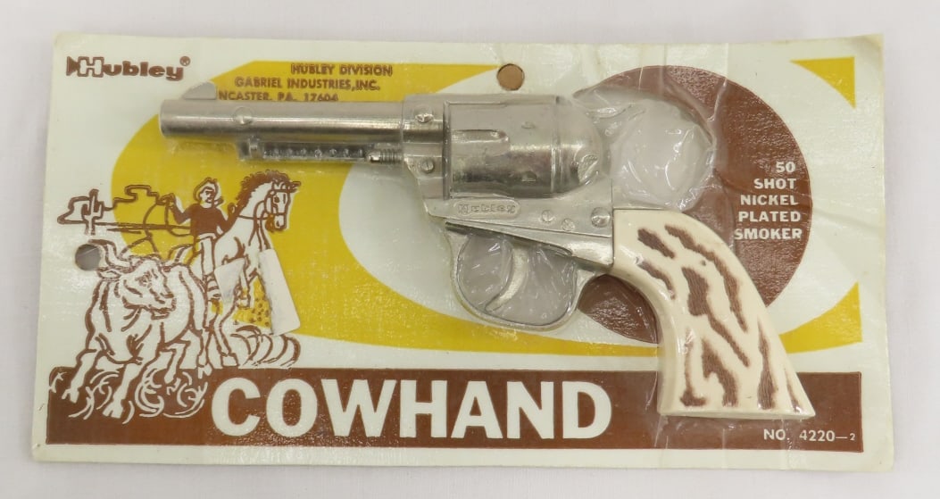 Hubley Cowhand cap gun in original package: Hubley Cowhand cap gun in original package Please ask questions and read terms & conditions before bidding.