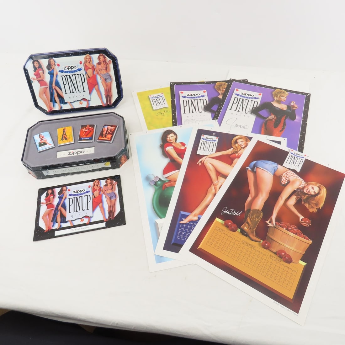 Zippo set of 4 Pinup LE lighters in tin with art: Zippo set of 4 Pinup LE lighters in tin with art Please ask questions and read terms & conditions before bidding.