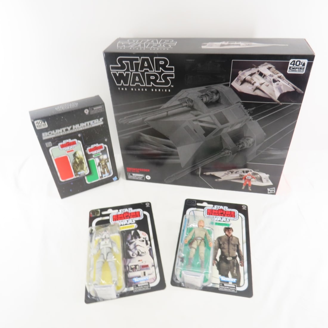 Star Wars The Black Series Snowspeeder Dak Ralter: Star Wars The Black Series Snowspeeder Dak Ralter NIP and other 40th anniversary Empire Strikes Back figures. NIP Luke Skywalker, Bounty Hunter AT-AT driver. Please ask questions and read terms & cond