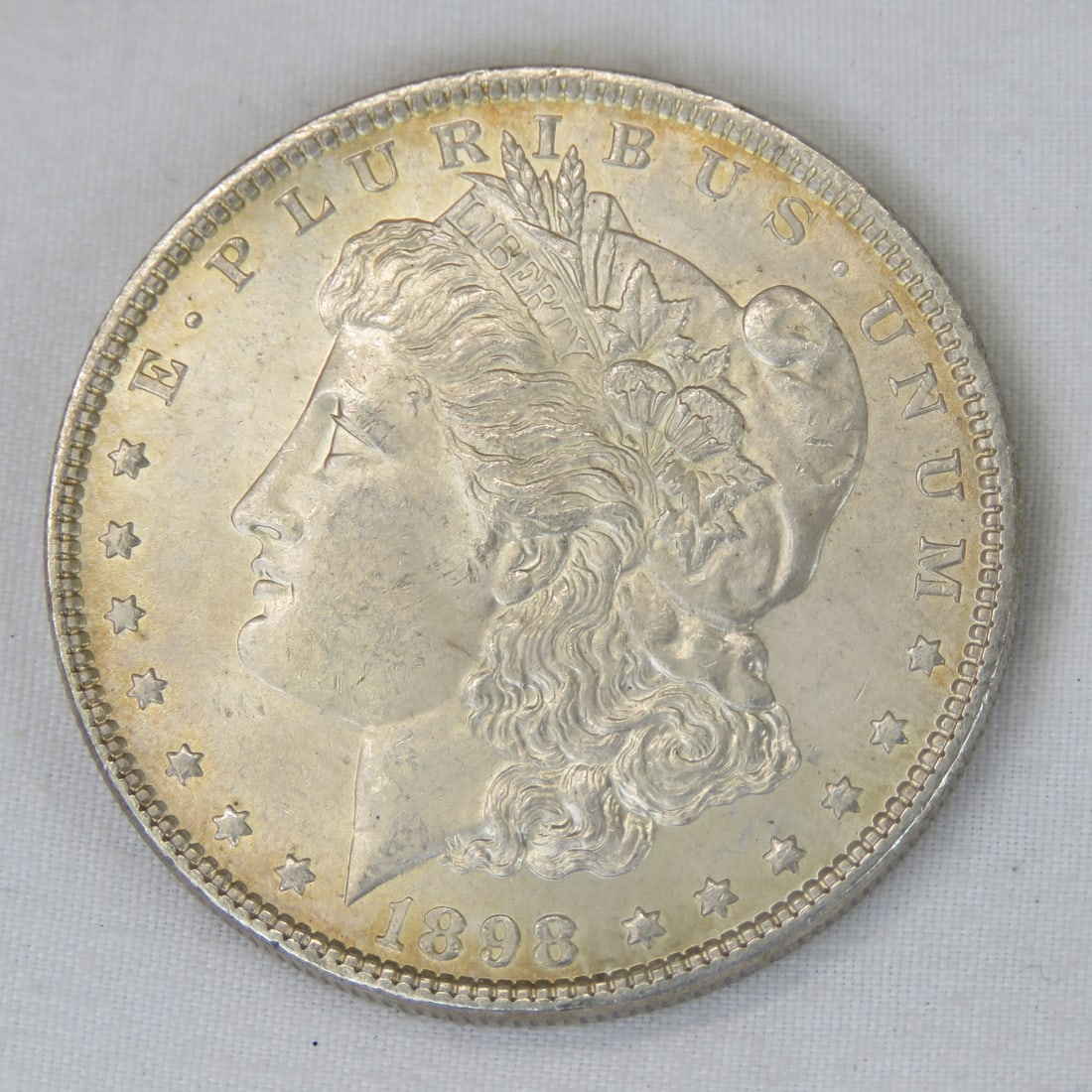 1898 Morgan Silver Dollar: Please ask questions & read terms & conditions before bidding.