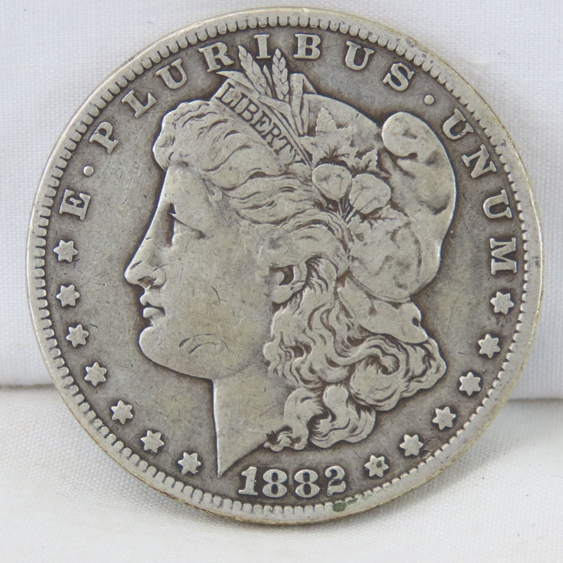 1882 CC Morgan Silver Dollar: Please ask questions and read terms & conditions before bidding.