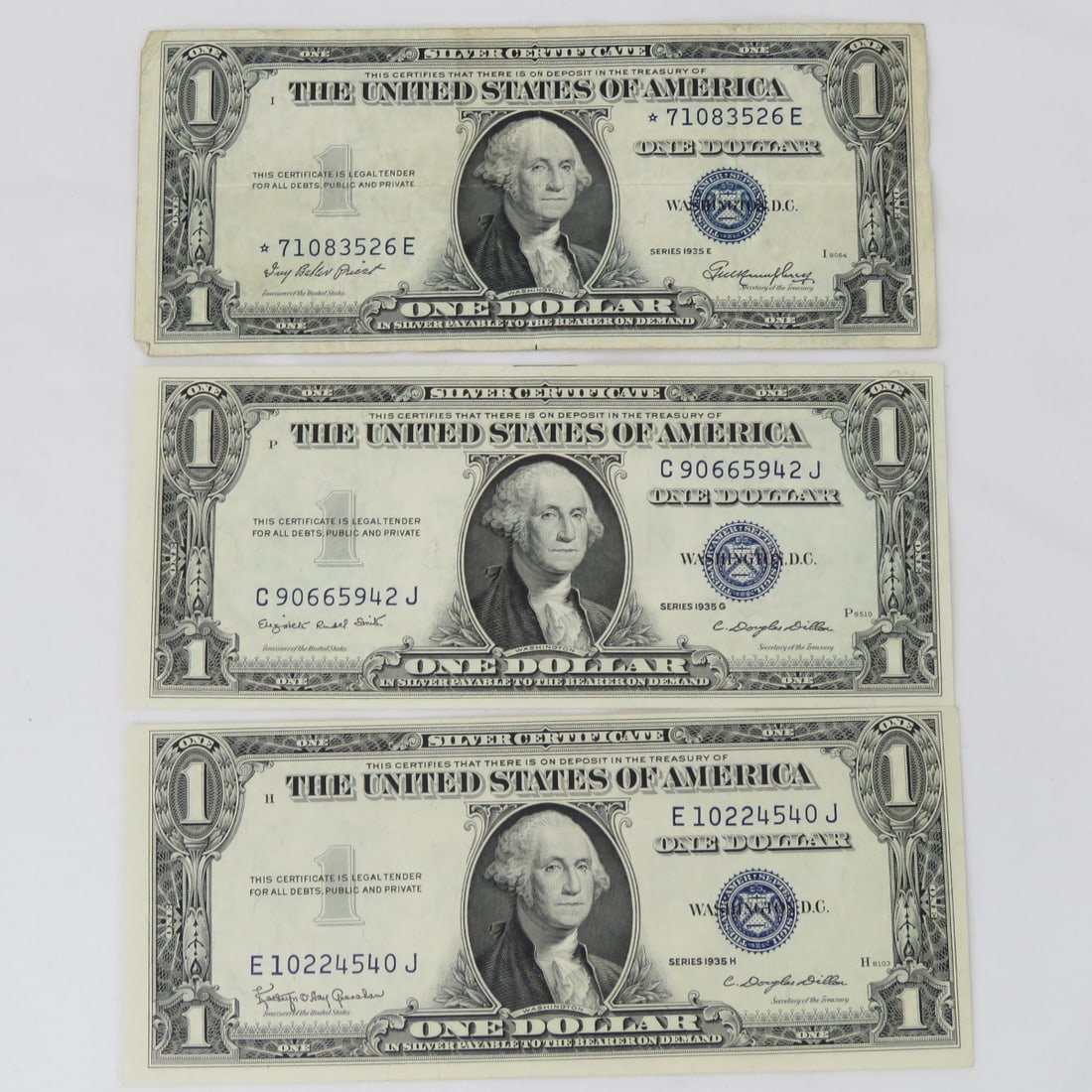 3 1935 $1 Silver Certificates 2 UNC, 1 Star Note (1 of 4)