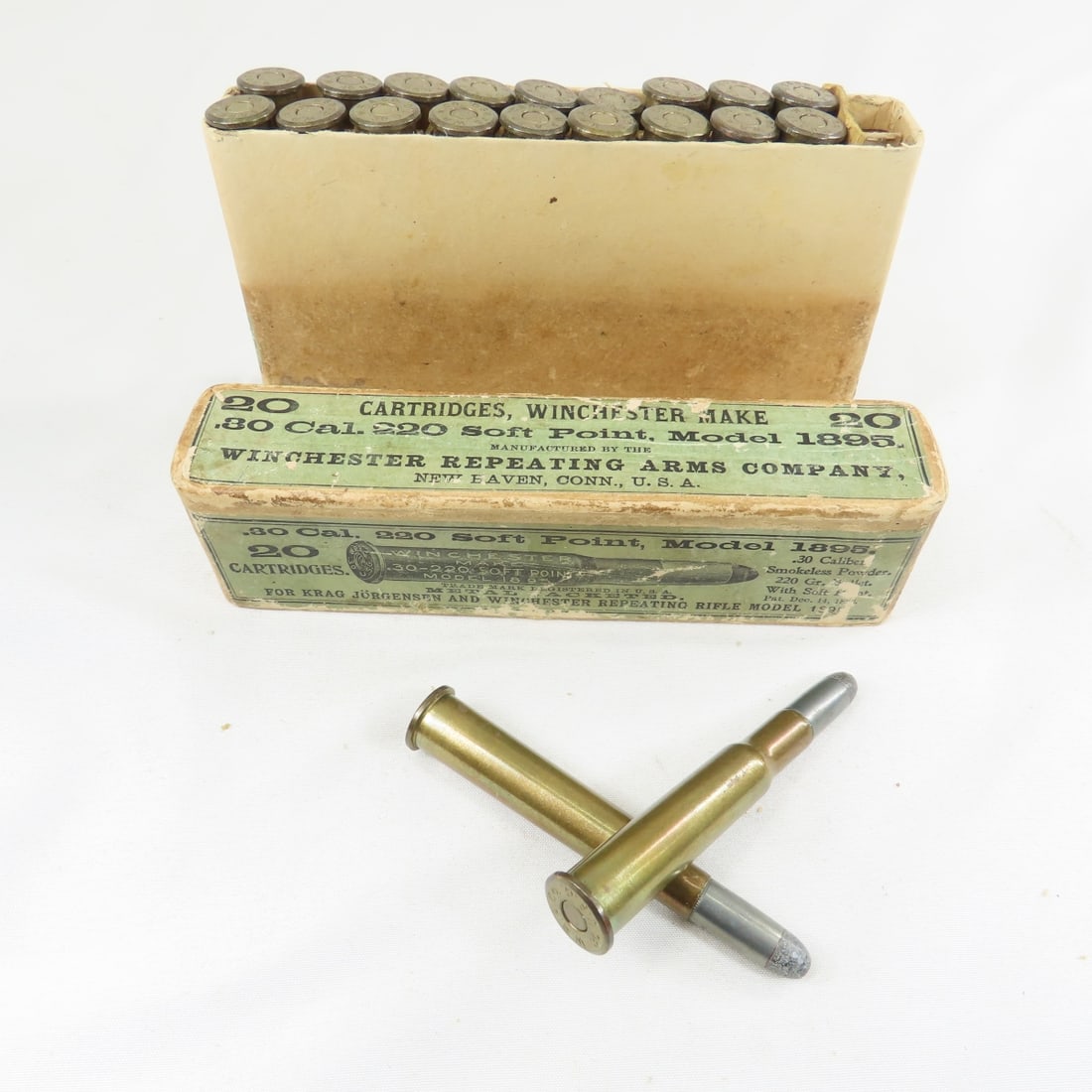 20 Antique Winchester .30 Mod 1895 Cartridges: model 1895 & Krag, smokeless 220 gr soft point, good overall condition in antique 2pc box which shows wear and tear from age- some tape, ammo may have corrosion and may not all be correct to box. Plea