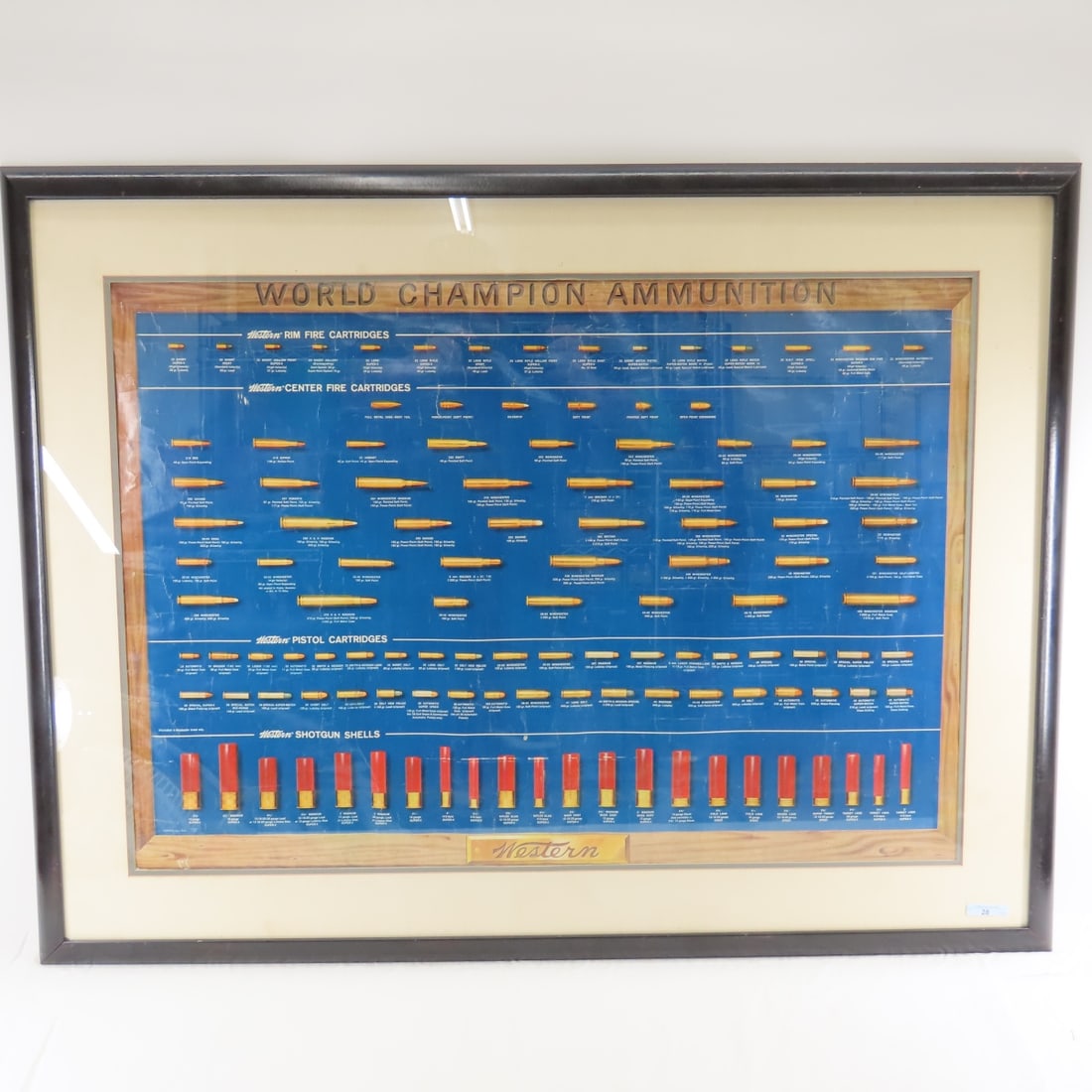 Vintage Western World Champion Ammunition Poster: Rev 5-61 poster has crease,1 small hole, some pen and other wear and tear throughout, matted and framed 42x33" Please ask questions and read terms & conditions before bidding.