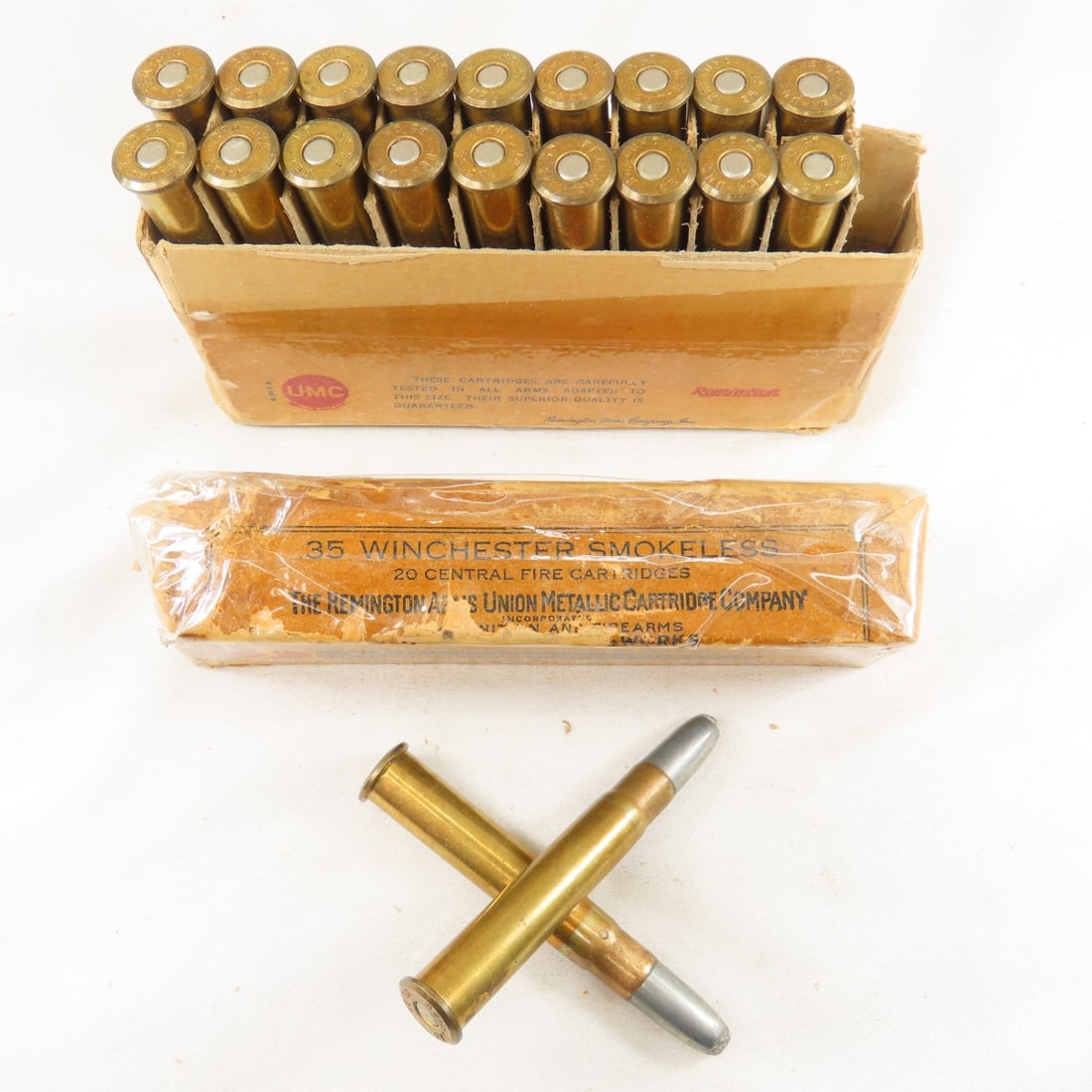20 Antique Winchester .35 Smokeless Cartridges: smokeless 250 gr soft point, good overall condition in antique 2pc box which has been taped- and shows wear and tear from age- ammo may have corrosion and may not all be correct to box. Please ask que