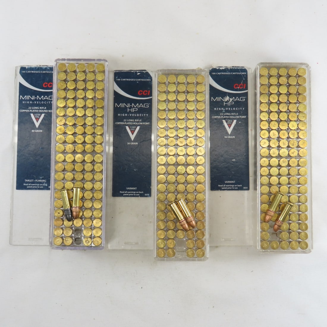 300 Assorted .22 Long Rifle HP Cartridges: 3 CCI plastic boxes wit 295 rounds of copper plated HP with "F" head stamp, last 5 rds are lead round nose with "C" head stamp, ammo may not be original to boxes. Please ask questions and read terms &