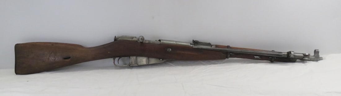 1952 Polish Mosin Nagant M44 Rifle with Bayonet: bolt action 7.62 X 54 R rifle, receiver marked with 11 in an oval, 1952 and the SN# KC24148,same SN# is also dot matrix printed on top of receiver, bolt SN# BF1719, magazine plate SN# KC24148, butt pl