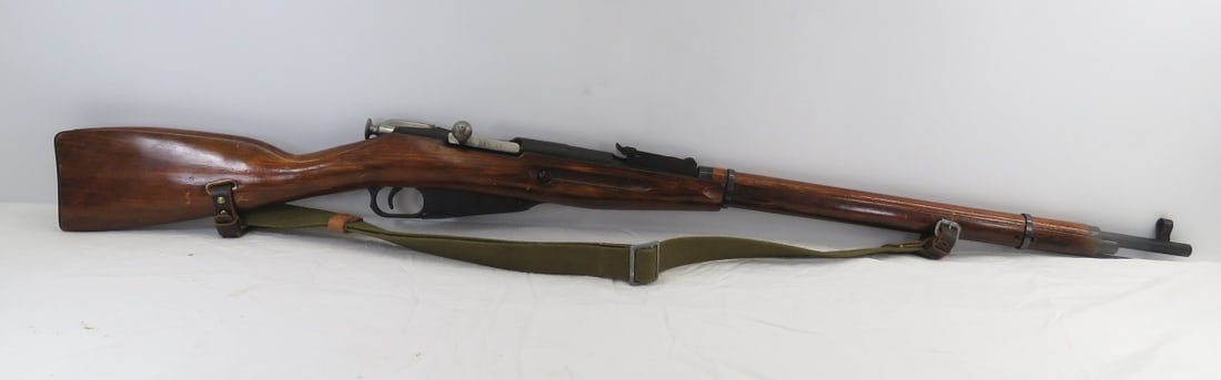 1942 Russian M91/30 Mosin Nagant Rifle: 28" barrel with hooded front sight and rear ladder sight, receiver marked: 1942r, E 3083, import mark "M91/30 Russia 7.62x54R CAI GEORGIA VT 9130160661", bolt SN#3083, butt plate SN# 3083, magazine pl