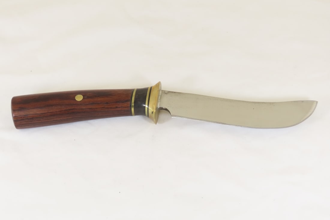 Hand Made Custom Knife by Dr. Robert E Molenaar: Hand Made Custom Knife by Dr. Robert E Molenaar 5160 steel light Skinner style knife flared brass guard with brass fiber & Corian spacers. Rose wood handle blade is 5 inches, 10 inches overall. Signed
