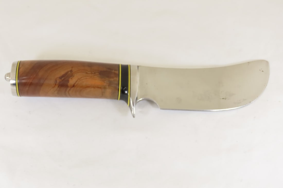 Hand Made Custom Knife by Dr. Robert E Molenaar: Hand Made Custom Knife by Dr. Robert E Molenaar Steel blade camp knife with finger notch, nickel silver fittings Box Elder handle, fiber spacers blade measures 5 inches 10 inches overall. Signed R.E.M