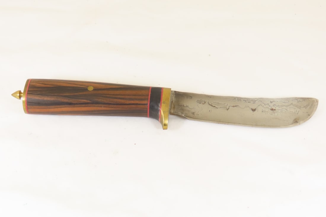 Hand Made Custom Knife by Dr. Robert E Molenaar: Hand Made Custom Knife by Dr. Robert E Molenaar Damascus style blade with forge patina on spine, brass guard & butt with button for keeper Strap, fiber & Corian spacers wood handle blade measures 4.75