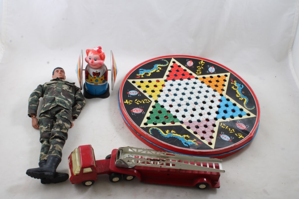 Soldier, Tonka Truck, Chinese Checkers, Windup Toy: Tonka is a Ladder Truck, Wind-up Toy is missing the key, but tested with one of our keys and it does work). Chinese Checkers does not have the marbles, but does have the checkers. All as pictured. Ple