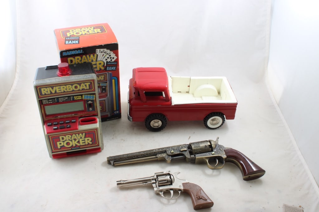 Structo Truck, 1851 Replica Navy Colt Pistol: 10" Structo Pickup Truck, Radica Draw Poker Game Bank & a Cap Gun all as pictured. Please ask questions & read terms & conditions before bidding.