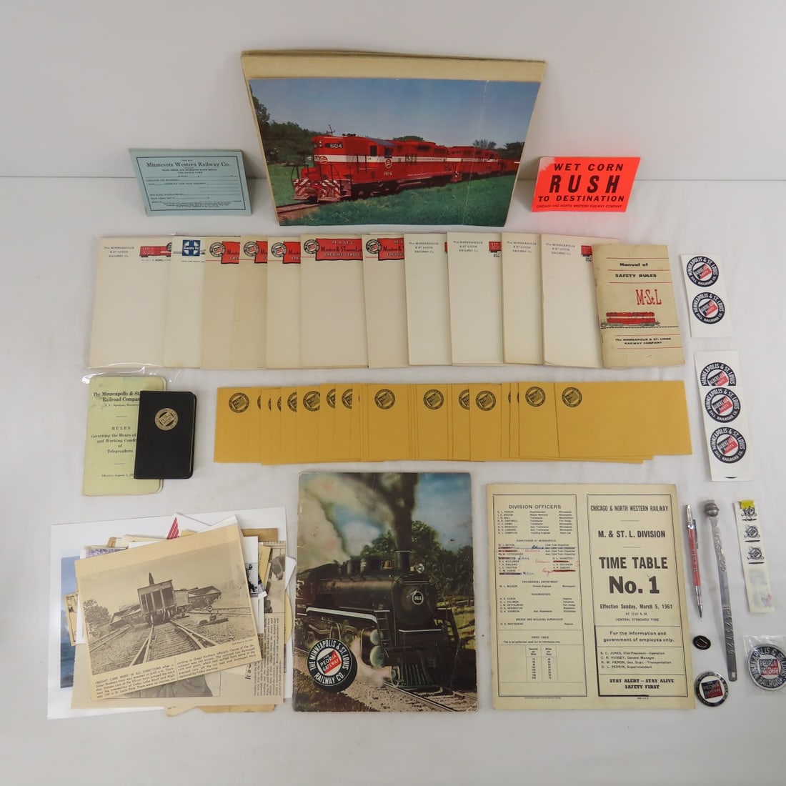 M&STL Ephemera and Collectibles: note pads, annual report, pencil, baggage tag, a few modern stickers and more. From the estate of the late Vern Wigfield. Please ask questions and read terms & conditions before bidding.