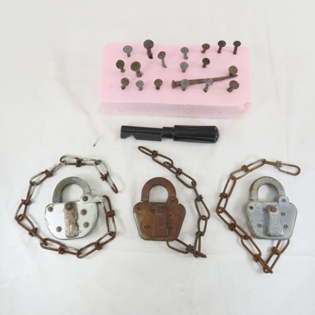 Date Nails, Locks & Locomotive Reverse Key: Please ask questions and read terms & conditions before bidding.