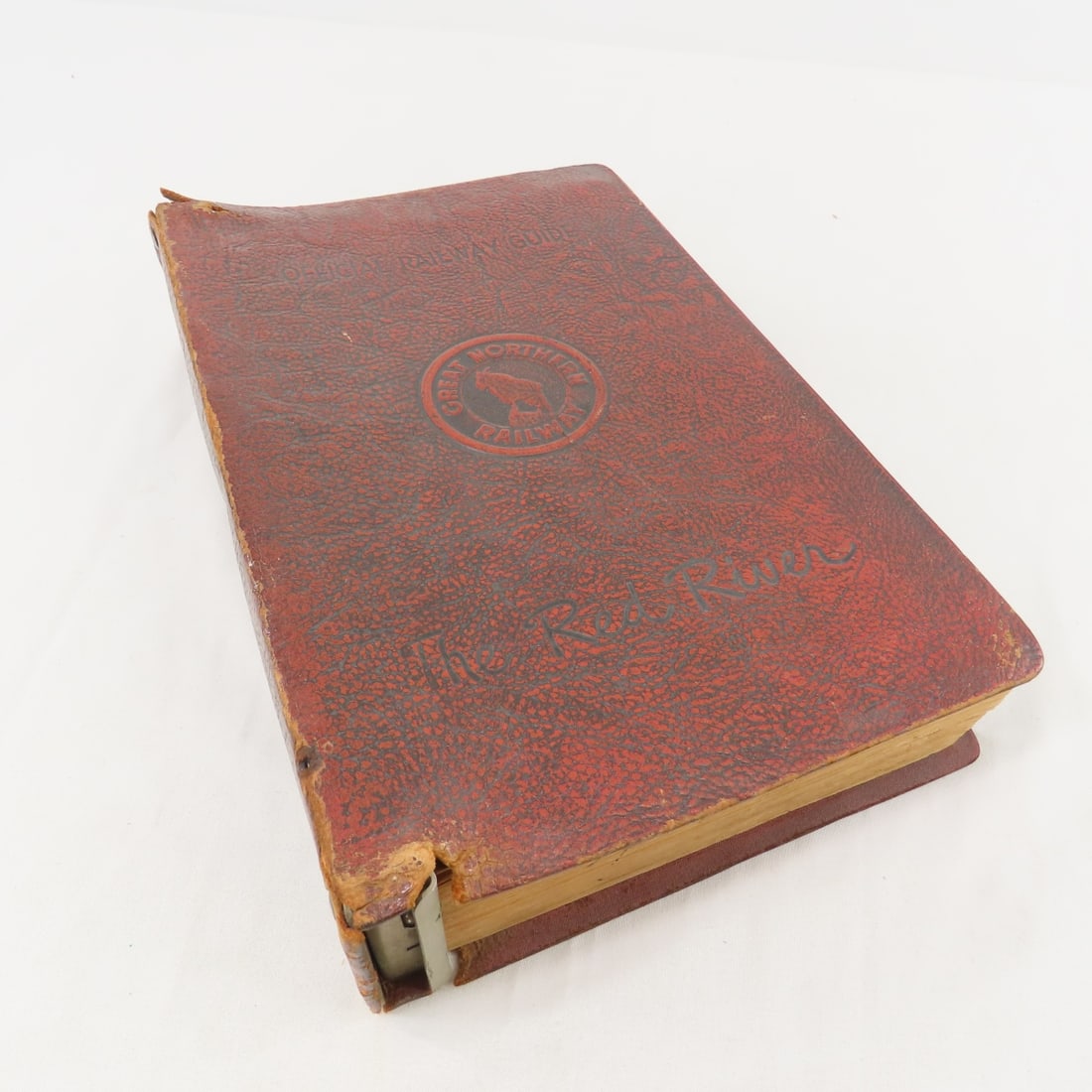 1949 Official Guide of the Railways: "Official Guide of the Railways and Steam Navigation Lines of the United States Porto Rico Canada Mexico and Cuba" in GN The Red River leather cover, cover page marked CMSTP&PRR. From the Collection o