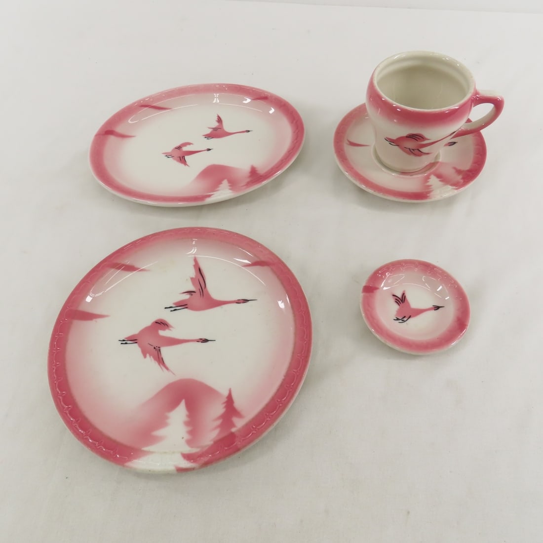 Milwaukee Road Traveler Dining Car China: no RR back stamps. cup and saucer, butter pat, 7 3/8" plate, 8" platter- all very good condition except plate which is in good condition with many cutlery marks. All Syracuse Econo-Rim except cup whic