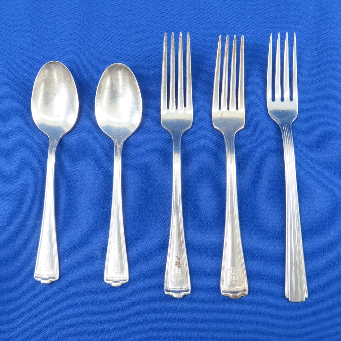 Rock Island Lines Flatware-4 Cromwell & 1 Empire: 1 Empire dinner fork- back marked "Rock Island Lines" and "Insico Stainless Steel", and 2 forks & 2 teaspoons Cromwell top marked RI, and bottom marked "Rock Island Lines" and " International Silver C