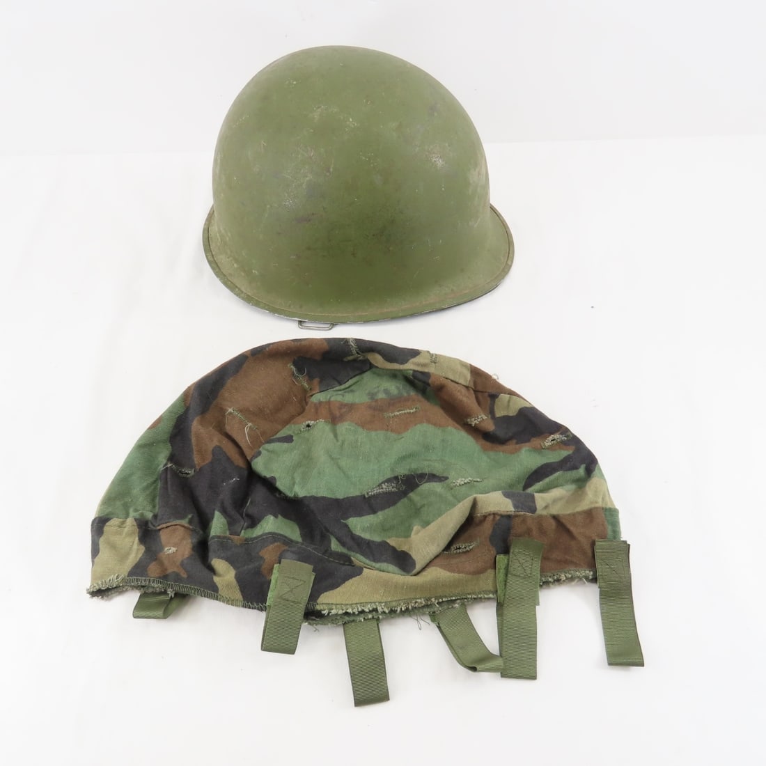 WWII US M1 rear seam helmet with liner: WWII US M1 rear seam helmet with liner- Please ask questions and read terms & conditions before bidding.