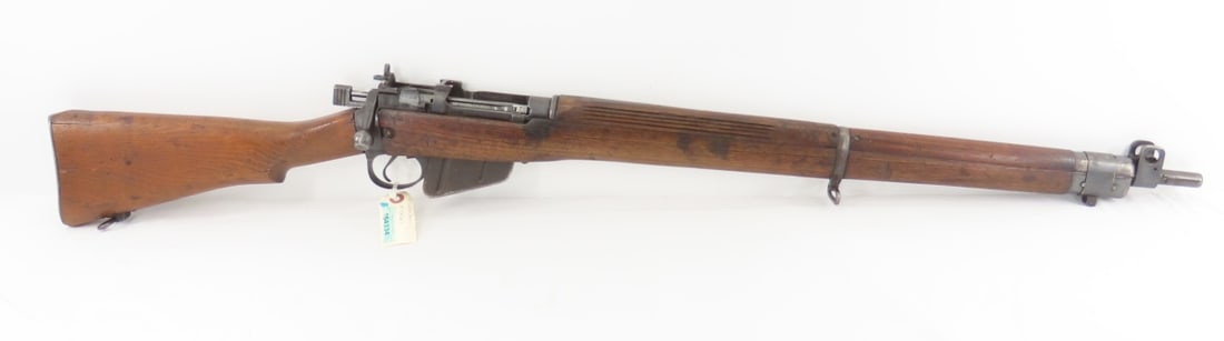 1943 Lee Enfield No4 Mk I Rifle.303 British: 1943 Lee Enfield No4 Mk I Rifle.303 British-left wrist marked " B 1943 X6647", receiver marked " No 4 MK I", rear flip sight, bolt marked "U14197", all wood- repair on stock near butt plate, wear norm