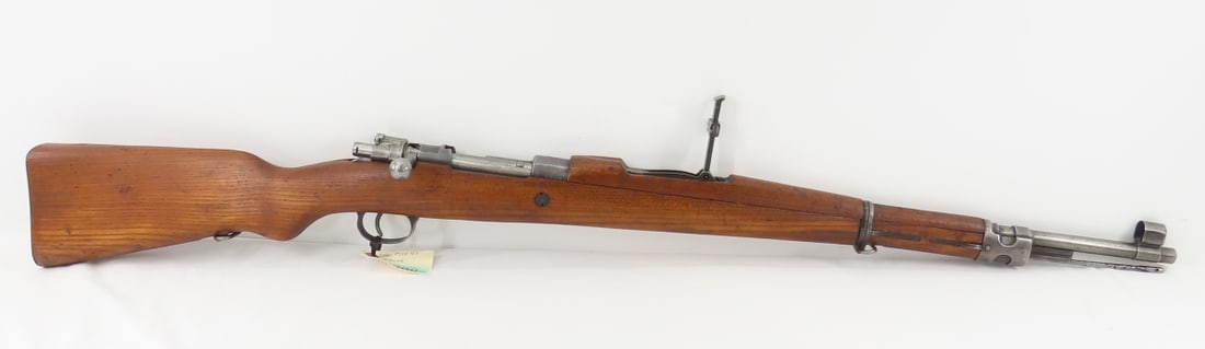 Yugoslavian M24/47 Mauser 8mm Rifle: Yugoslavian M24/47 Mauser 8mm Rifle-receiver with post 1948 state emblem of six torches within a circle of wheat ears, and left side marked M24/47, and right side marked A 1126, side rail in Cyrillic