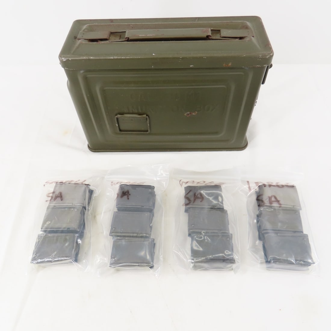 24 WWII M1 Garand En Bloc clips, stamped SA: 24 WWII M1 Garand En Bloc clips, stamped SA-in metal ammunition can Please ask questions and read terms & conditions before bidding.