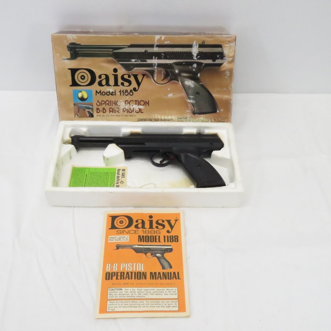 Daisy 188 Break Action Air Pistol with Box: Daisy 188 Break Action Air Pistol with Box - Box and Instructions state 'Model 1188', Has Compression Please read terms & conditions and ask questions before bidding.