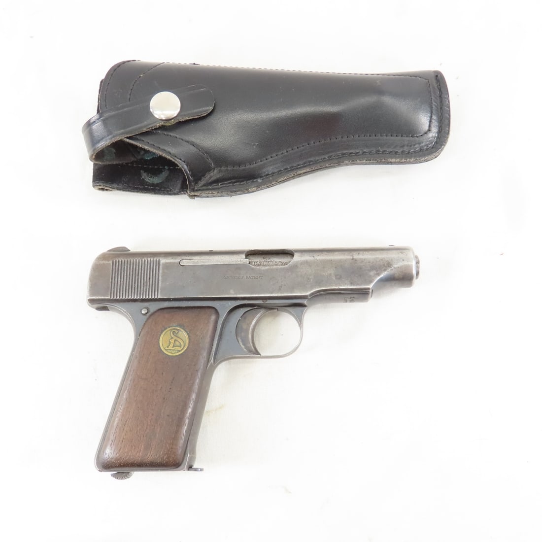 Ortgies Deutsche Werke Werkerfurt 7.65mm pistol: Ortgies Deutsche Werke Werkerfurt 7.65mm pistol - serial number 143992, with Browning leather holster, Ortgies' Patent, Germany with 5 round magazine, 3 1/4" Barrel, wood grips with D medallion. C&R o