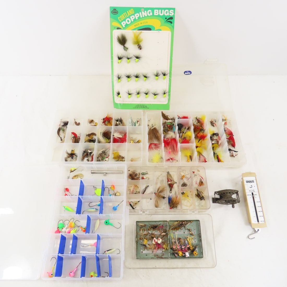 Collection of fly fishing lures, some on displays (1 of 10)