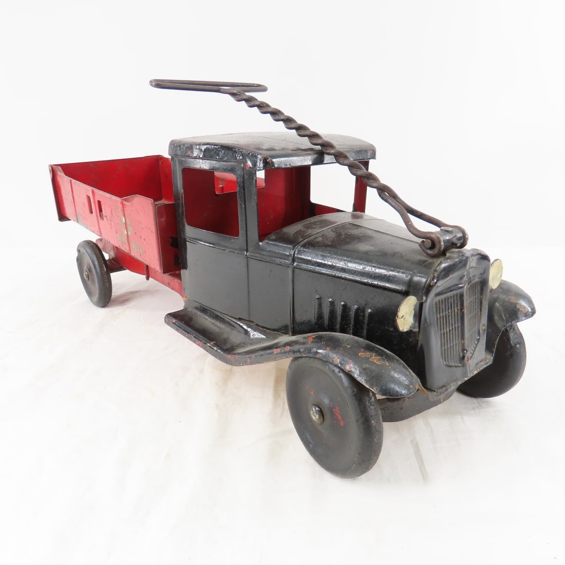 Buddy L Saddle Dump Truck: Buddy L Saddle Dump Truck - Please ask questions and read terms & conditions before bidding.