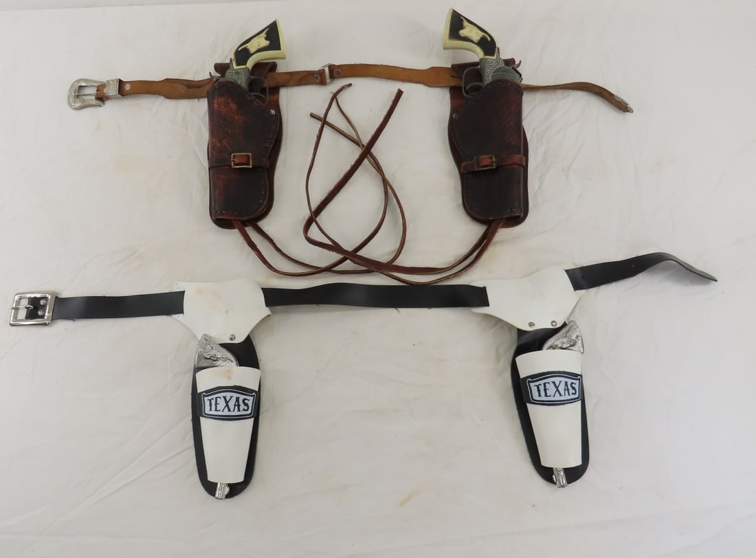4 Vintage Hubley Cap Guns in Holster Belts: 4 Vintage Hubley Cap Guns in Holster Belts - all metal TEXAS pair in black/white TEXAS set, black and white grips in brown leather holster belt Please ask questions and read terms & conditions before