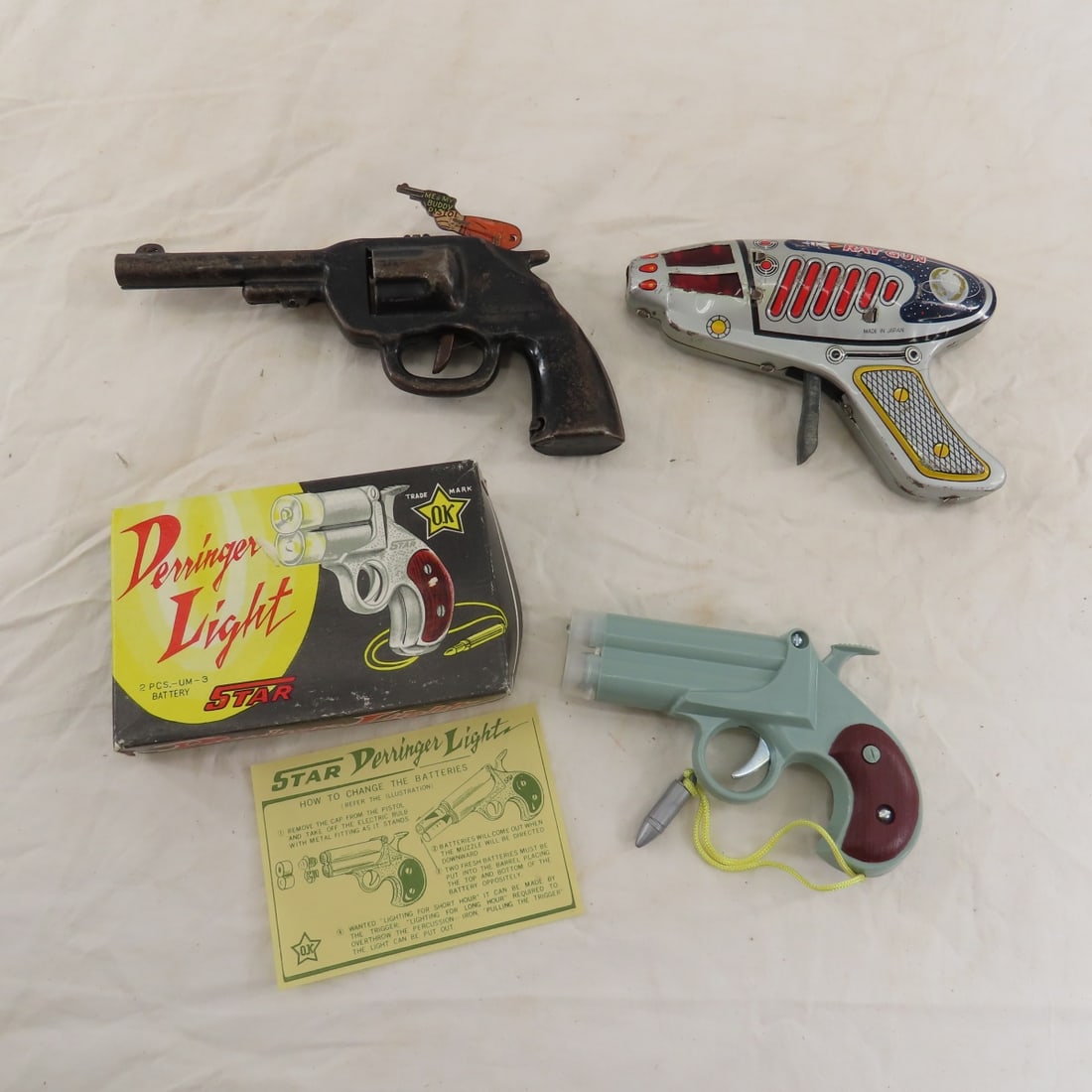 Wyandotte Clicker, Tin Laser & Flashlight Toy Guns: Wyandotte Clicker, Tin Laser & Flashlight Toy Guns - Wyandotte Me and my Buddy clicker gun- works, Japan Ray Gun makes noise, and Flashlight gun in box- works Please ask questions and read terms & con