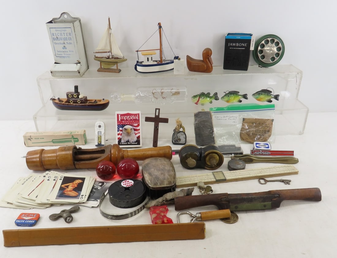 Glass ship in bottle, bottle corker, slide rule (1 of 13)