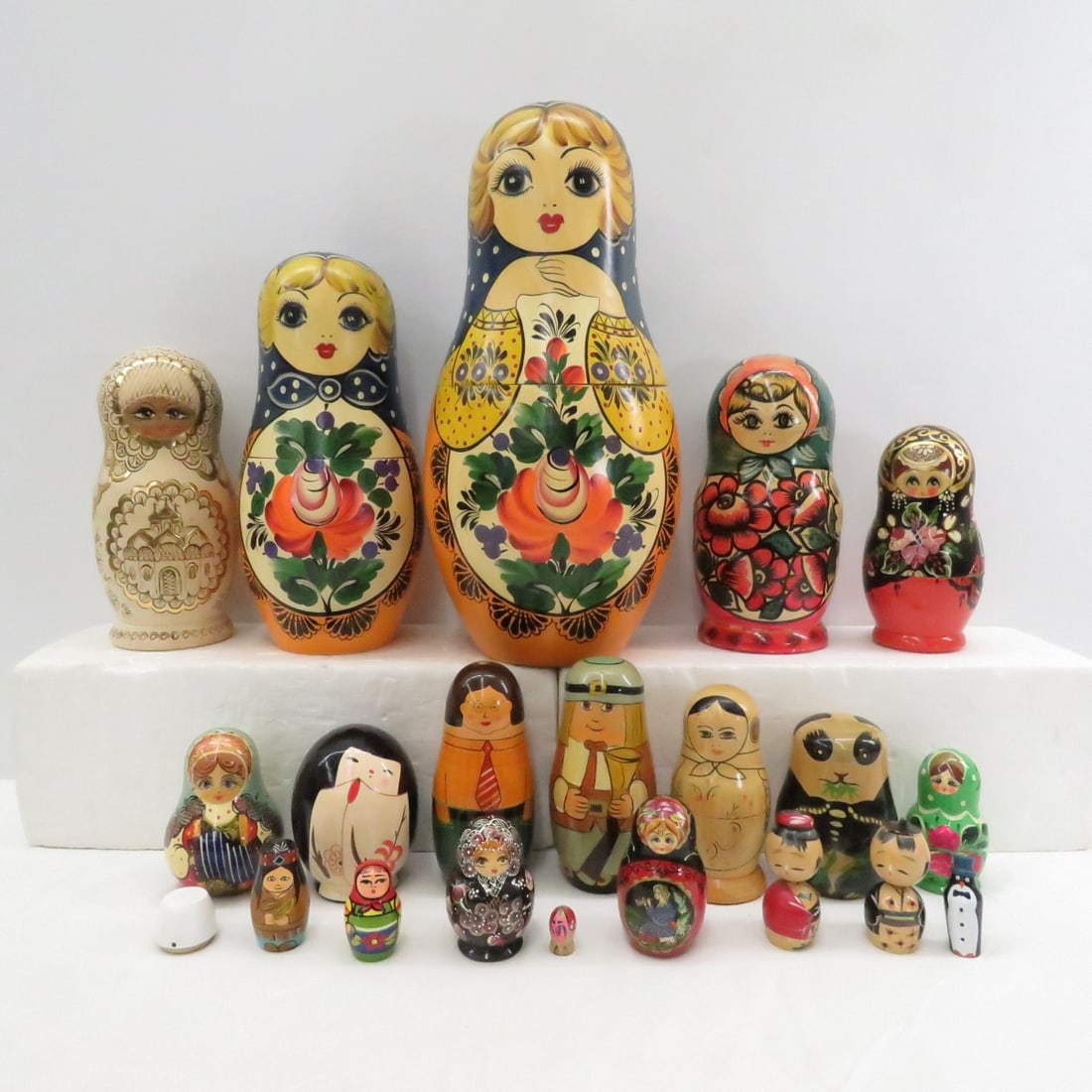 Ukrainian and Other Wood Matryoshka Nesting Dolls: Ukrainian and Other Wood Matryoshka Nesting Dolls - Largest is 14" tall x 21 circumference Please read terms & conditions and ask questions before bidding.