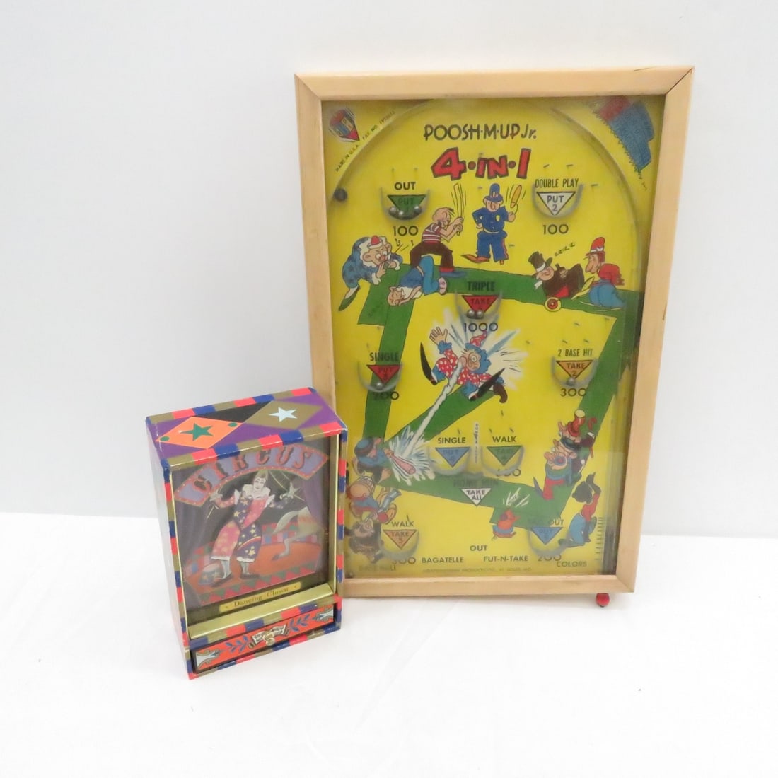 Poosh M Up Pinball & Circus Clown Music Box: Poosh M Up Pinball & Circus Clown Music Box - Pinball Game 17" x 11", Music Box Works Please read terms & conditions and ask questions before bidding.
